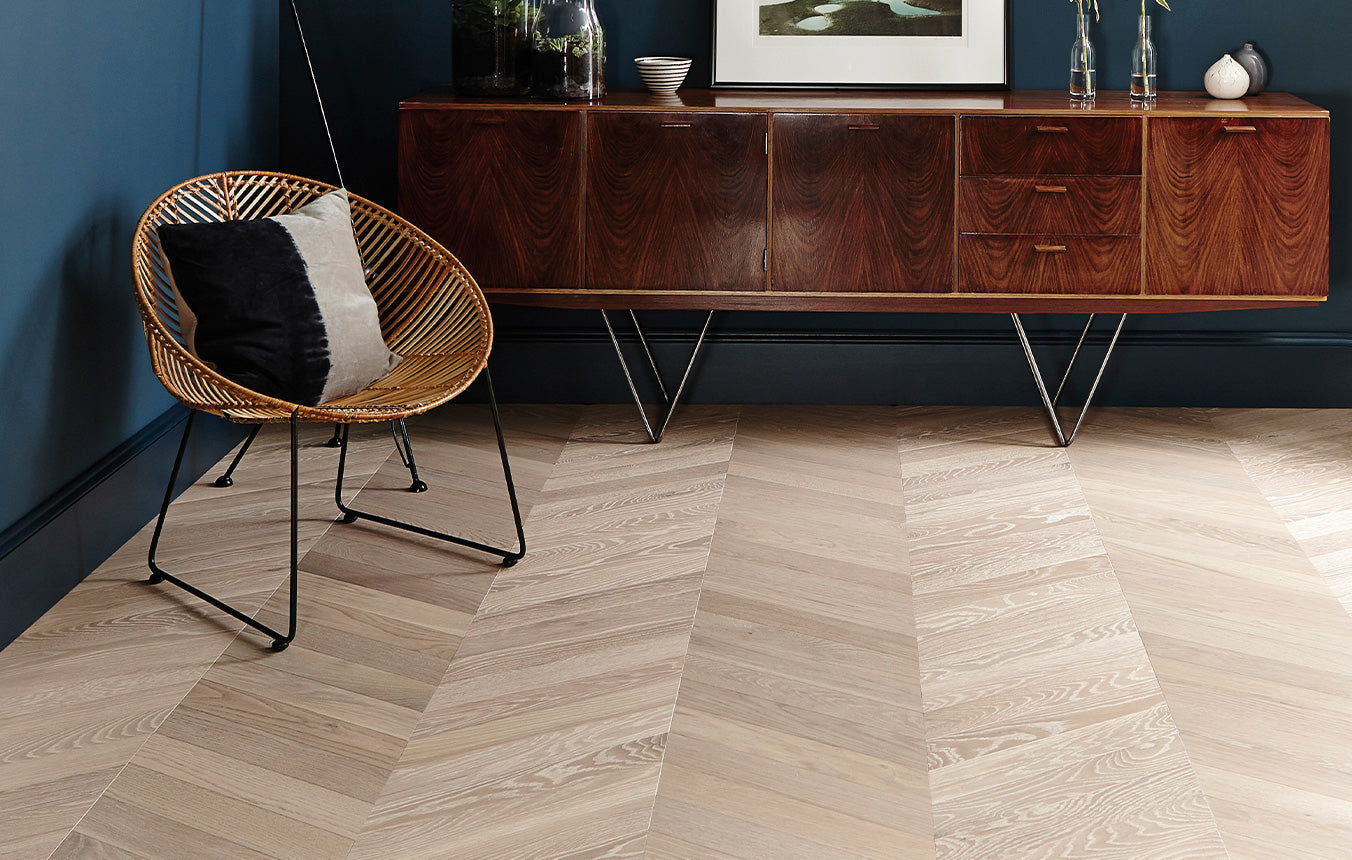 Engineered chevron wood flooring in natural light oak