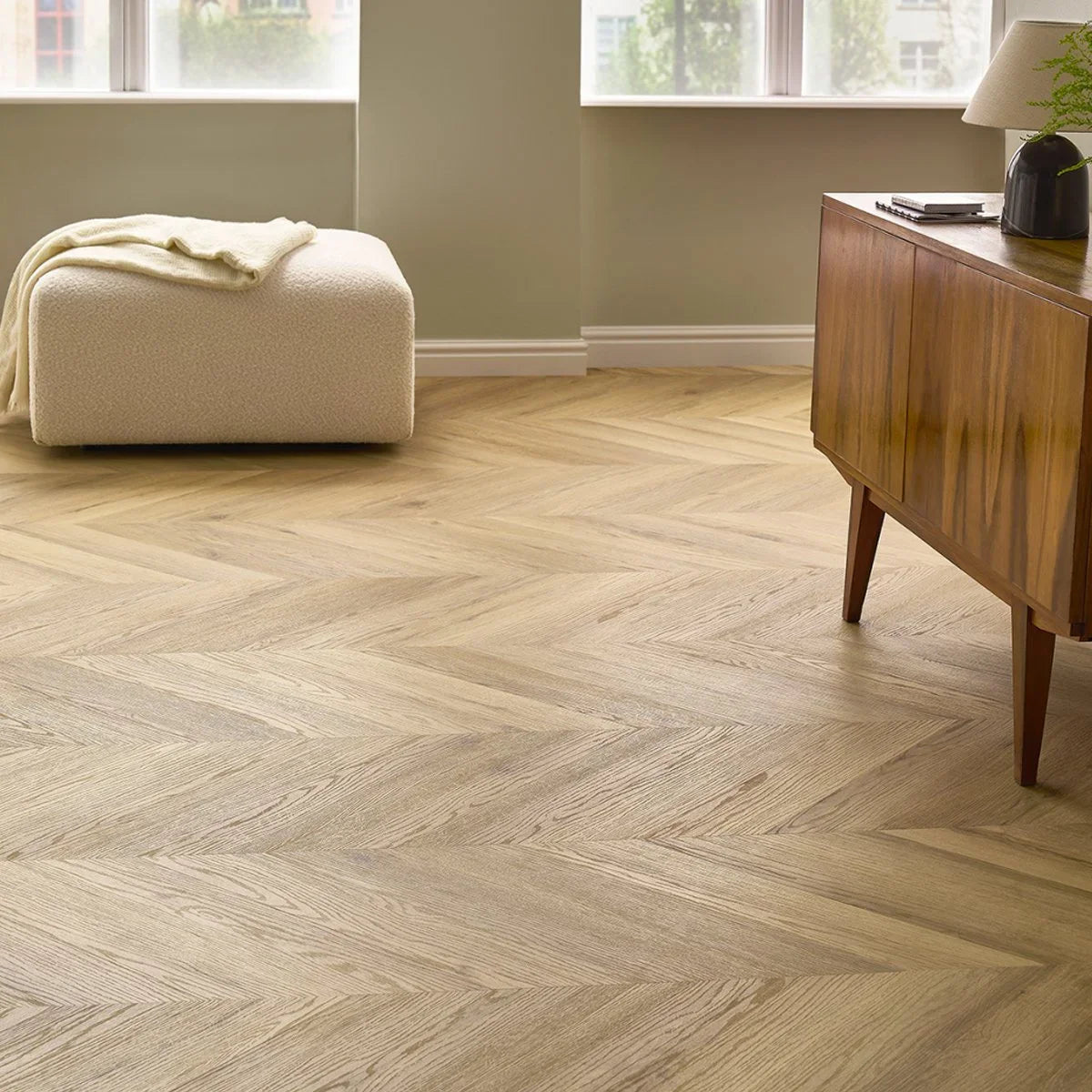 Chevron pattern click LVT vinyl floor in oak finish